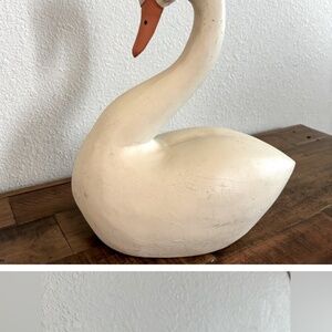 Ike and Spillman white swan sculpture